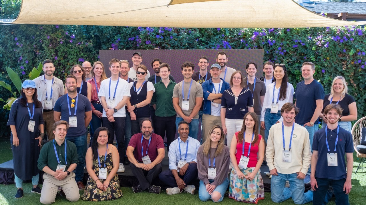 Lateral Workshop participants posing for a group photo outdoors